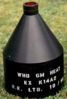 A high performance conical shaped charge, built to UK military specifications